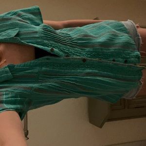 Short Sleeved Collared Button Up.